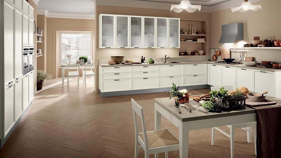 Stylish white kitchen design with a dining table