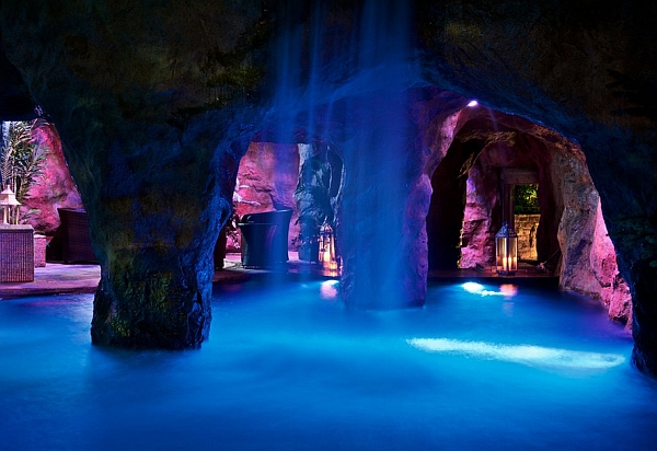 Stunning indoor pool with watterfalls and swim-through grotto that leads to a swim-up bar!