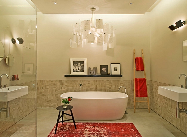 Vivid red accents enliven the contemporary bathroom