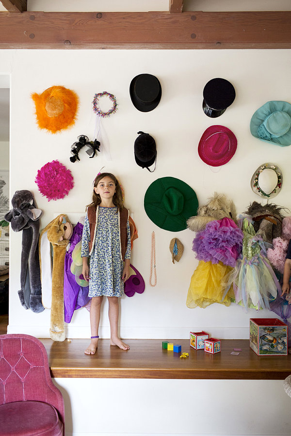 Wall of hats in a girl's room