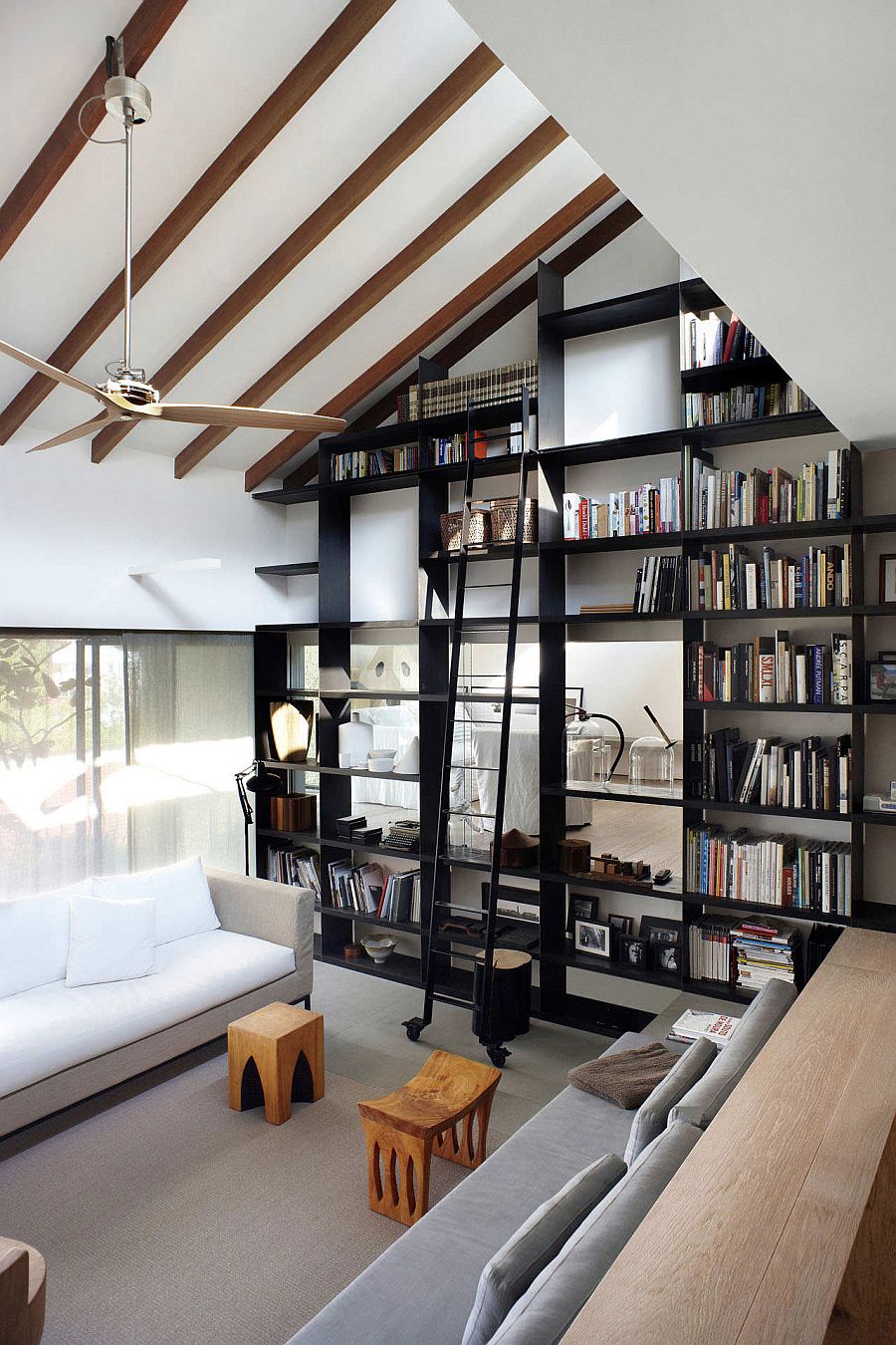 black bookcase in large living room