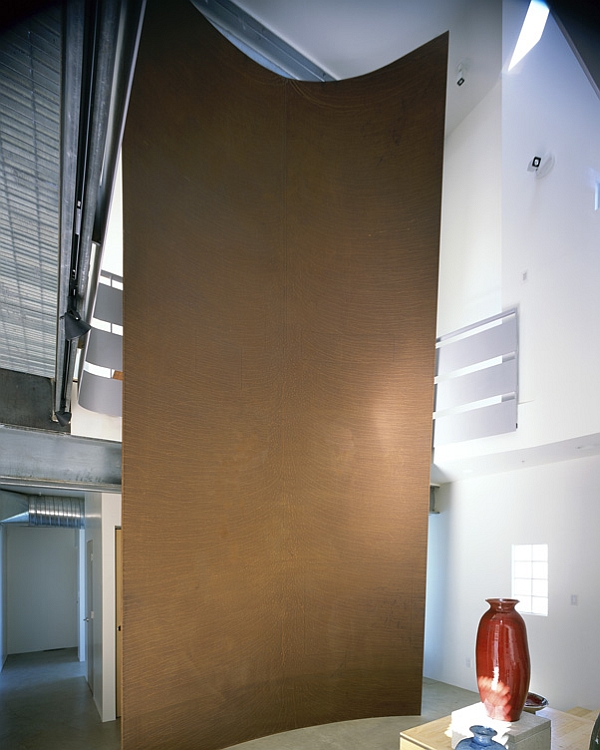 Amazing torqued steel wall inside the home