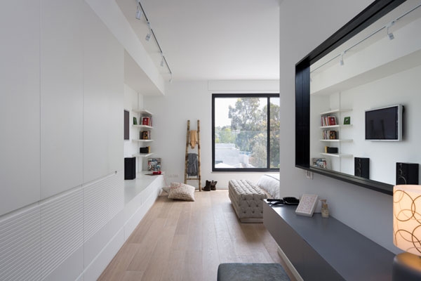 Ample storage options and stylish shelves in the bedroom