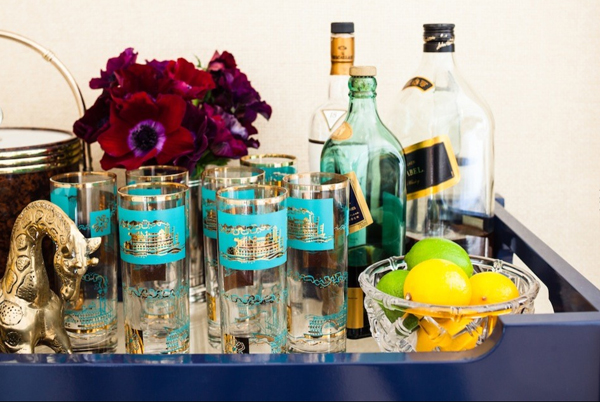 Bar cart with fruit and flowers