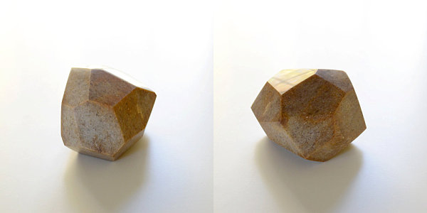 Brown marble geometric sculpture