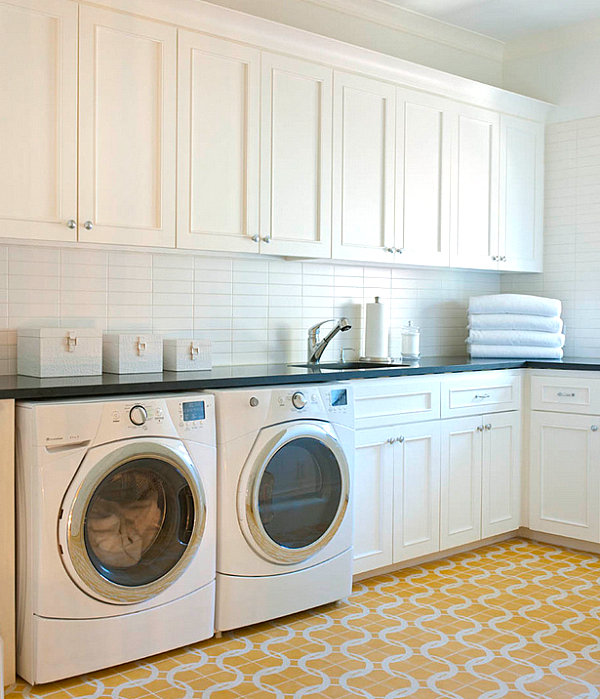 Cabinet storage in a laundry room with a tile floor