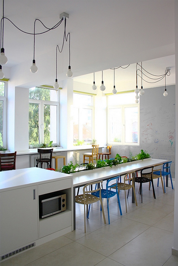 Colorful chairs at the large dining table