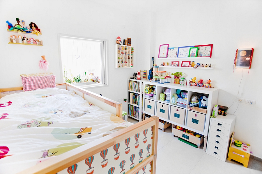 Colorful kids' bedroom with loads of toys