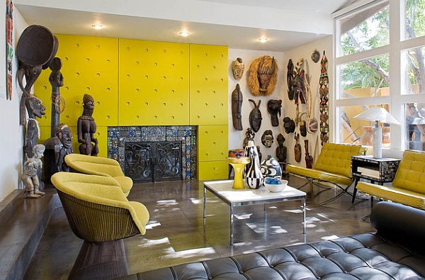 Colorful living room displays a wonderful collection of African statues and artifacts