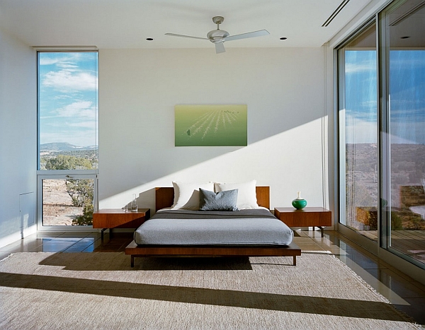 Contemporary bedroom inside steel-framed prefab home