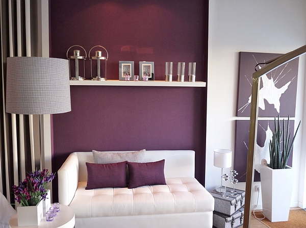 Contemporary living room with a purple accent wall