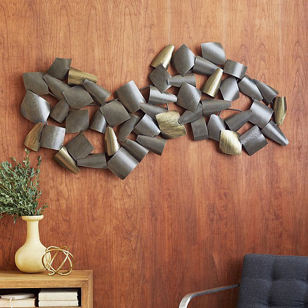 Curved wall art in metallic tones