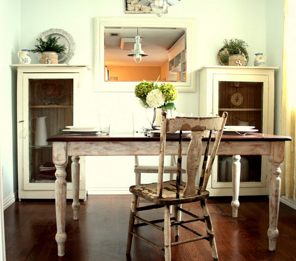 Distressed table and chair in a French country dining nook