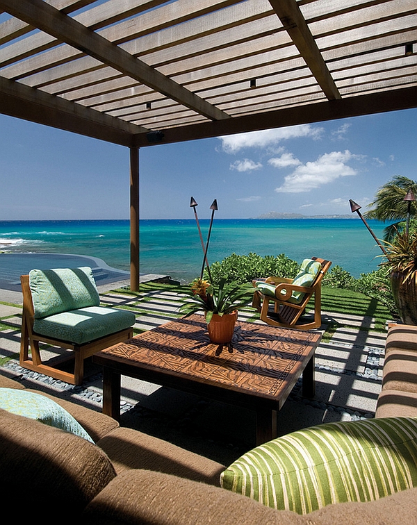 Enjoy unabated ocean views under the shaded pergola