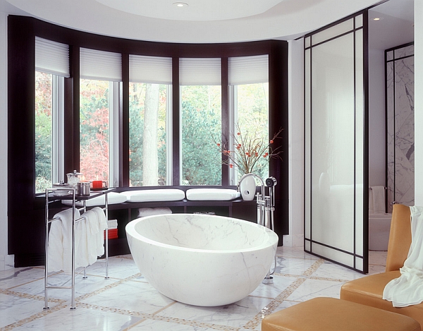 Freestanding marble bathtub in an Asian themed bathroom