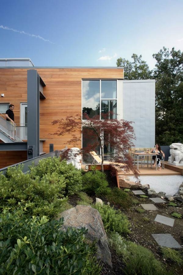 Glass and wooden exterior of the house