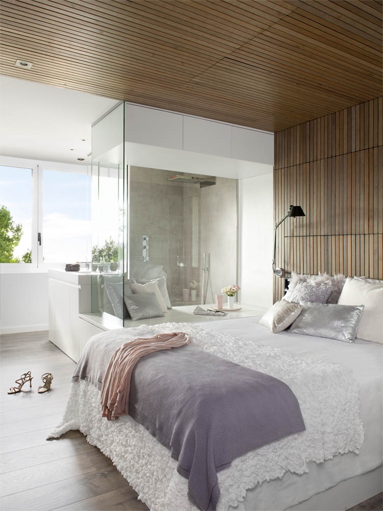 Gorgeous bedroom in white with wooden backdrop