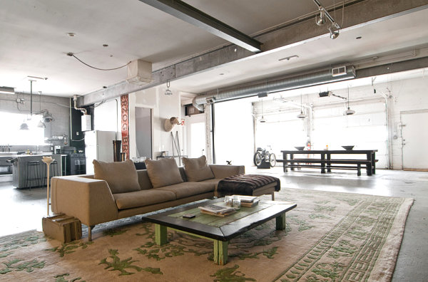 Industrial design style living room with an exposed ceiling