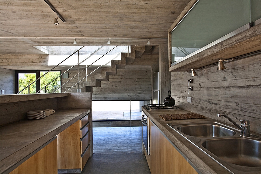 Industrial style kitchen design in wood and concrete