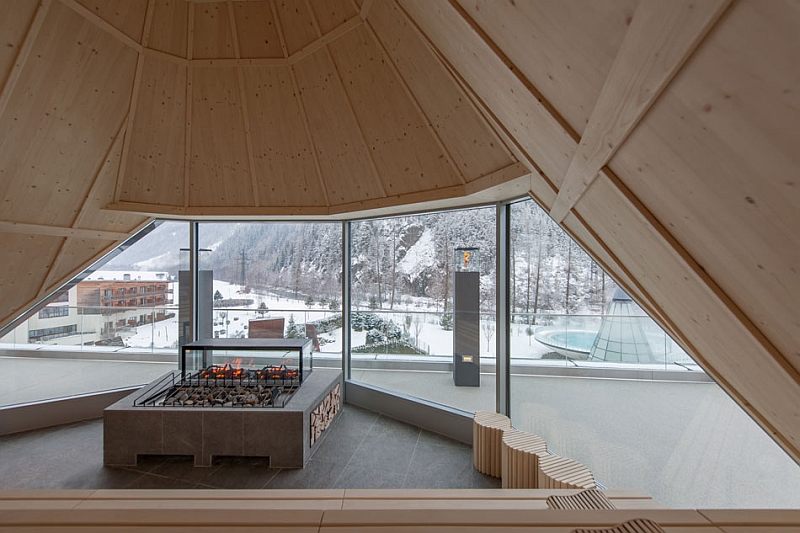 Interior with wooden walls and stunning fireplace