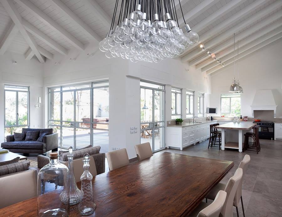 Kitchen and dining room of the modern villa in Petah Tikva