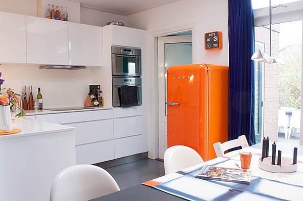 Kitchen of 1930s family home with a splash of color