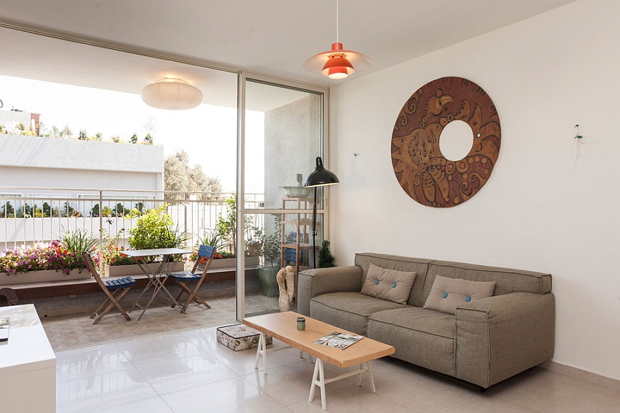 Living room connecetd with the balcony with glass doors