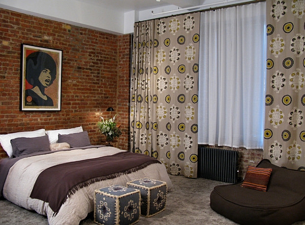 Loft apartment bedroom blends the eclectic with the African