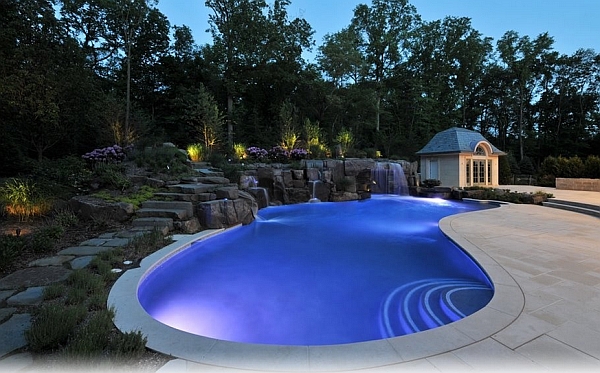 Luxurious cabana adjacent to the pool with waterfalls