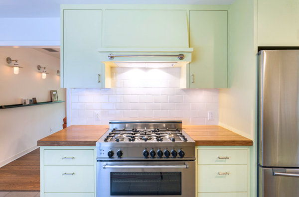 Mint green cabinets