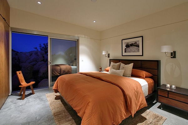 Modern bedroom with tangy orange accents