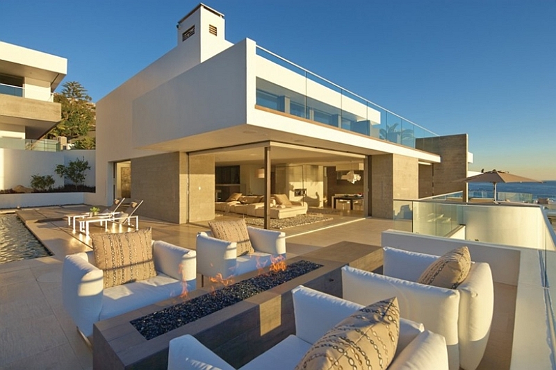 Outdoor fireplace in the patio with sweeping ocean views