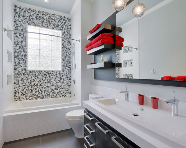 Red accents in a black and white bathroom