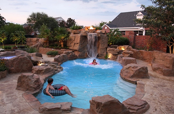 Rock swimming pool with a captivating and grand waterfall feature