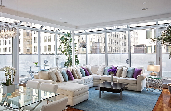 Rug and throw pillows add color instantly in the New York Penthouse