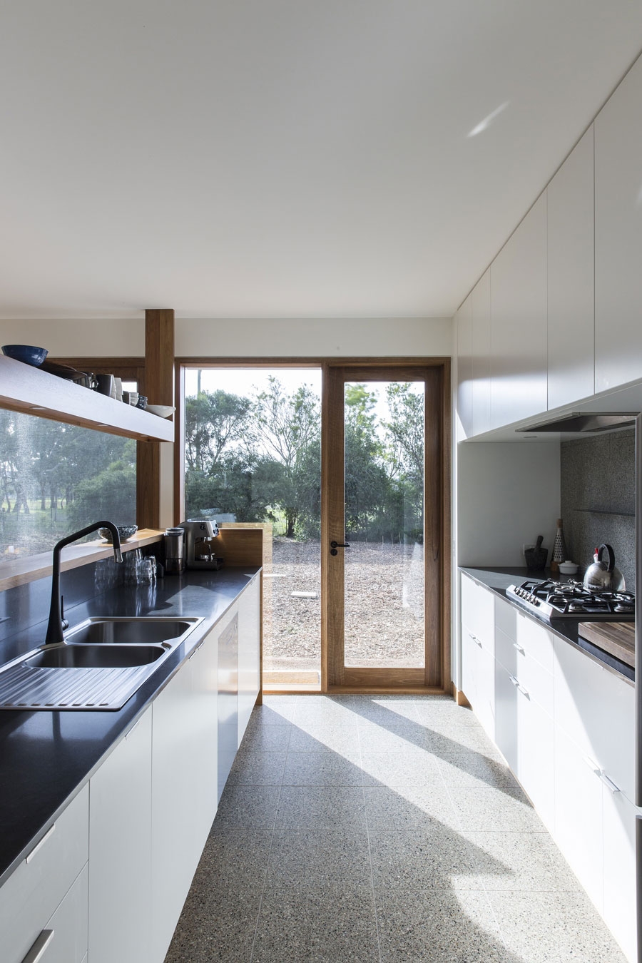 Small kitchen space connected with the outdoors