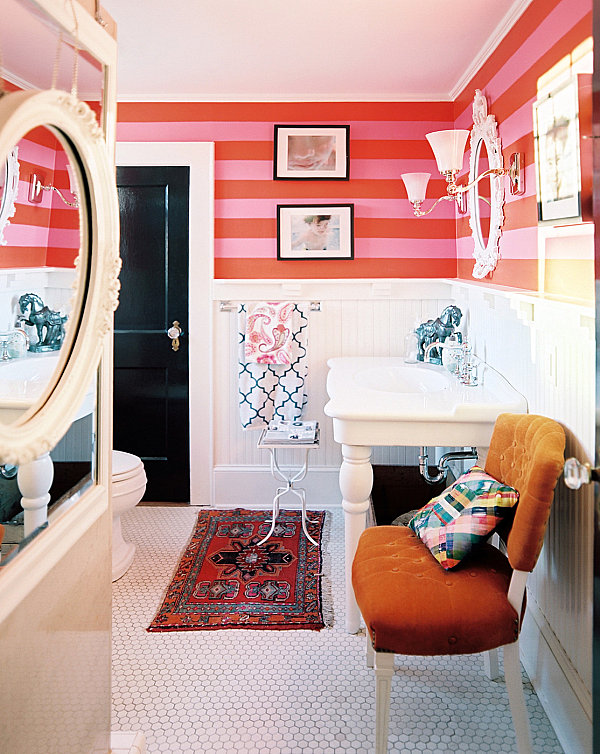 Striped walls in a colorful bathroom