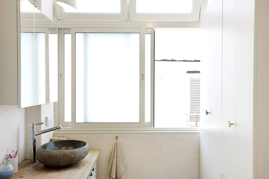 Stylish stone sink inside the bathroom