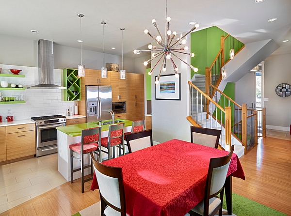 The Orbit Chandelier hangs stylishly above the dining table