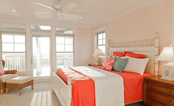 Tropical bedroom with peach and coral tones