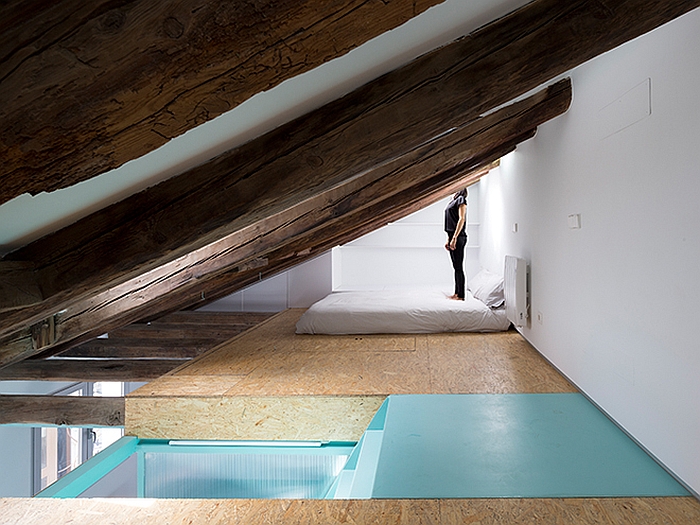 View of the bedroom and the bathroom in the loft