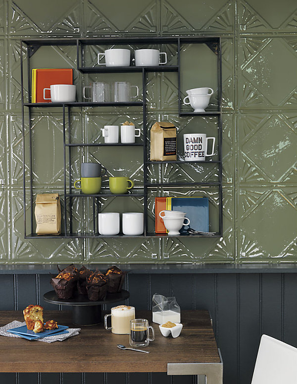 Wall shelf above a table and chairs