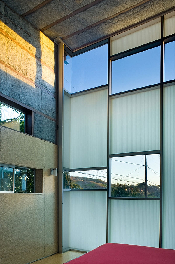 Walls of the metallic structure home blend privacy and unabated views