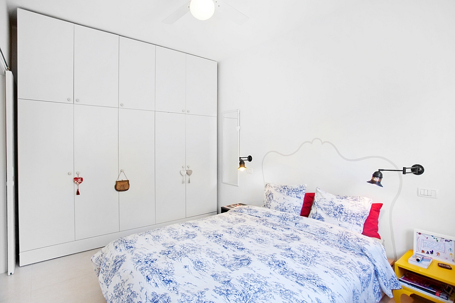 White wardrobe and shelves in the bedroom