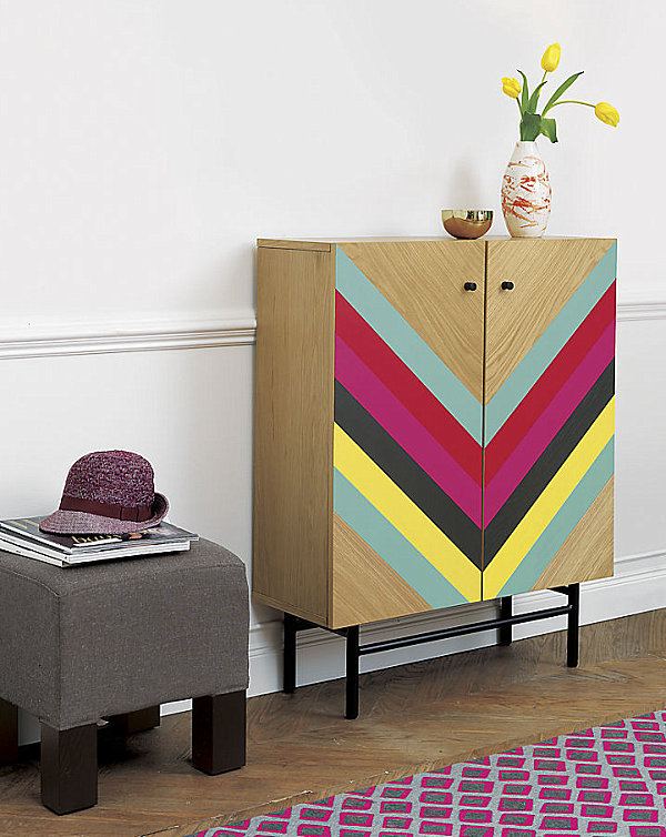 Wooden cabinet with colorful bands