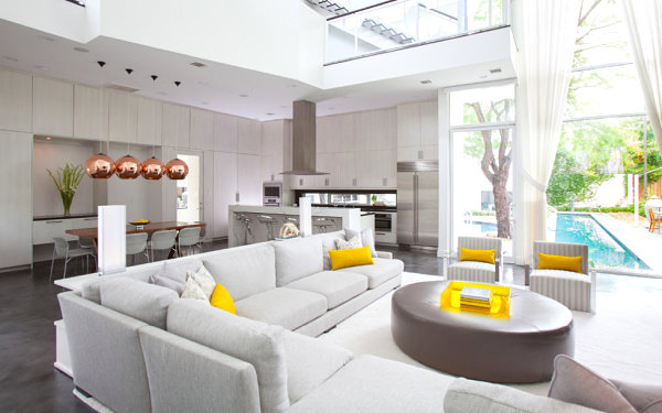 Yellow pops of color in a gray living room