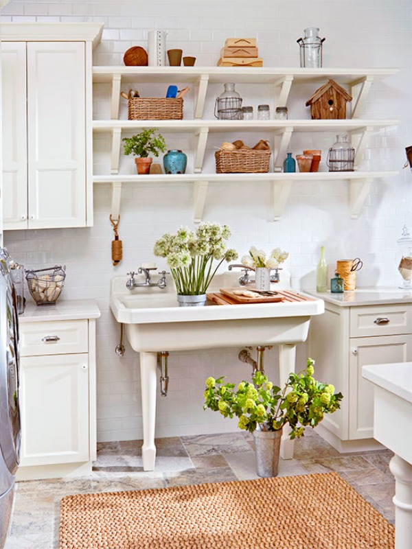 White laundry room with pedestal sink