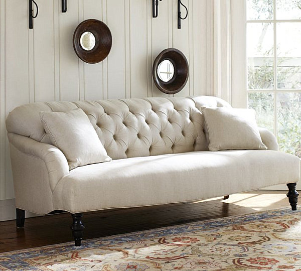 Curved tufted sofa