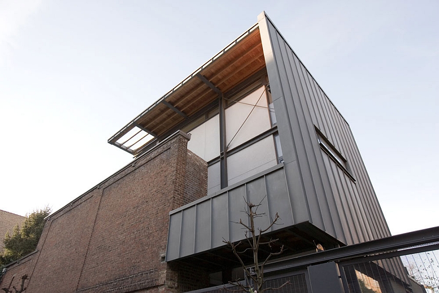 Exposed steel and brick structure of the house