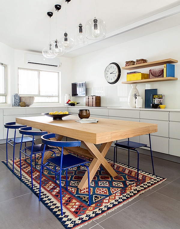 Glass pendant lights above the dining table